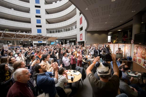Large group of people celebrating at CERN