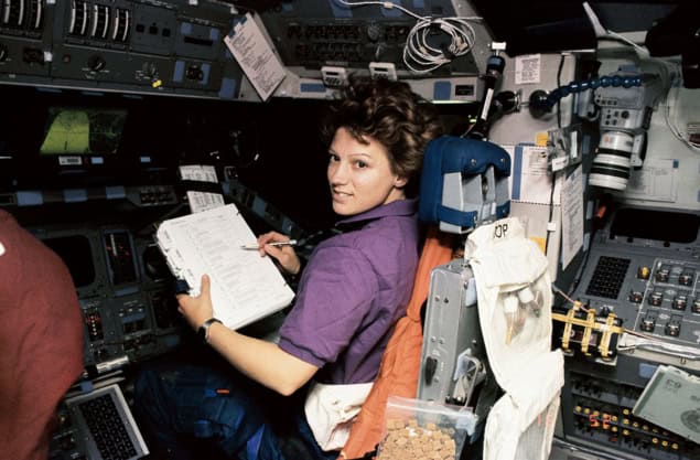 Eileen Collins in the pilot’s station of the NASA Space Shuttle Discovery