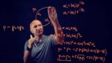 Photo of Artur Ekert solving maths equations on a glass screen