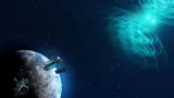 Artist's impression of the gravitational wave and electromagnetic radiation signals from a distant binary neutron star merger arriving at Earth. The image shows the Earth floating in space with a telescope hovering above it in the bottom left corner, while in the top right corner a pair of bright spots are emitting ghostly blue waves