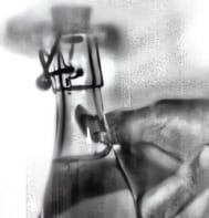 high-speed image of opening a swing-top bottle