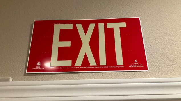 Photoluminescent exit sign Photoluminescent exit sign