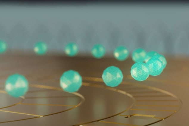 In this artist's depiction of a trapped-ion quantum computer, green, triangular-faceted blobs hover in a ring above a gold surface divided into compartments