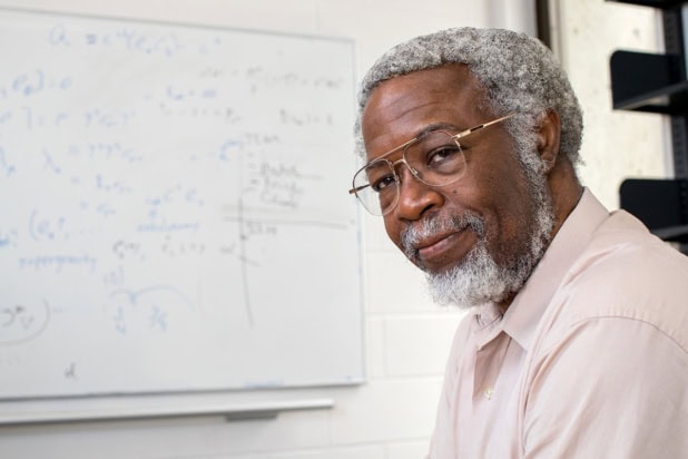 Jim Gates with a whiteboard
