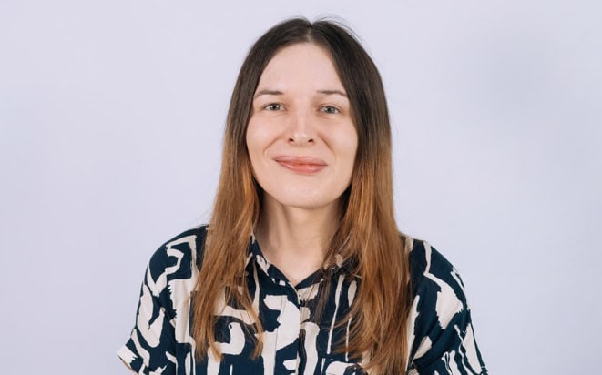 Smiling white woman with long hair