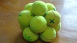 Stack of 11 tennis balls arranged with a base of 5n+1