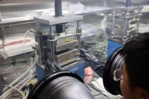 Photo of a researcher working in a glovebox