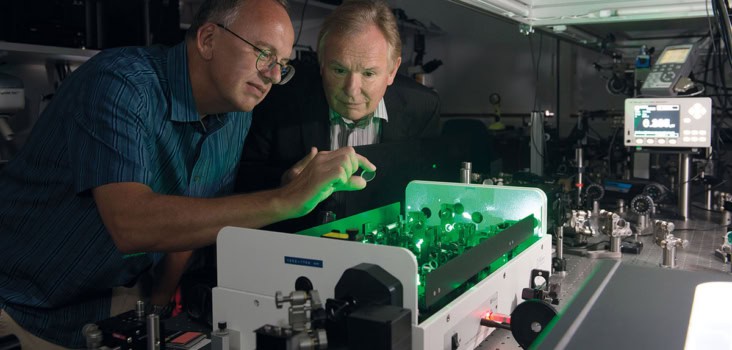 Two men with laboratory equipment