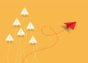 white arrows with a red arrow going in another direction