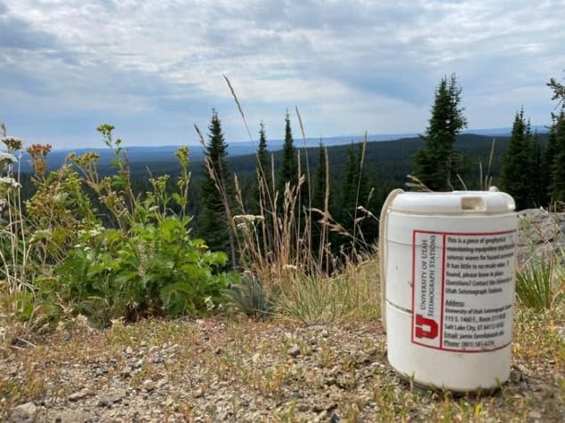geophone-yellowstone A photo of a portable seismometer outdoors with trees and grass in the background