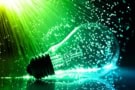 Fiber optics background with light bulb