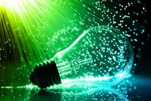Fiber optics background with light bulb