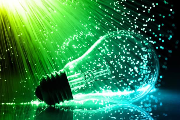 Fiber optics background with light bulb
