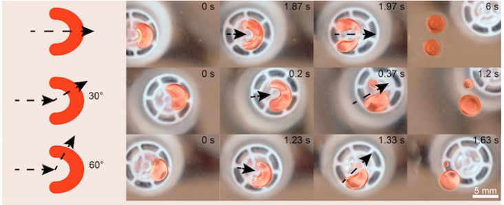 A series of images showing droplets of orange liquid separating and splitting on a grey background