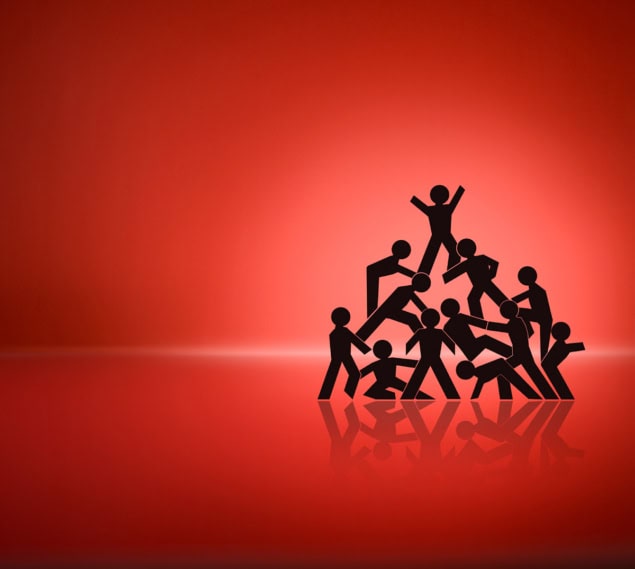 human-pyramid-cartoon-4932020-istock teamwork