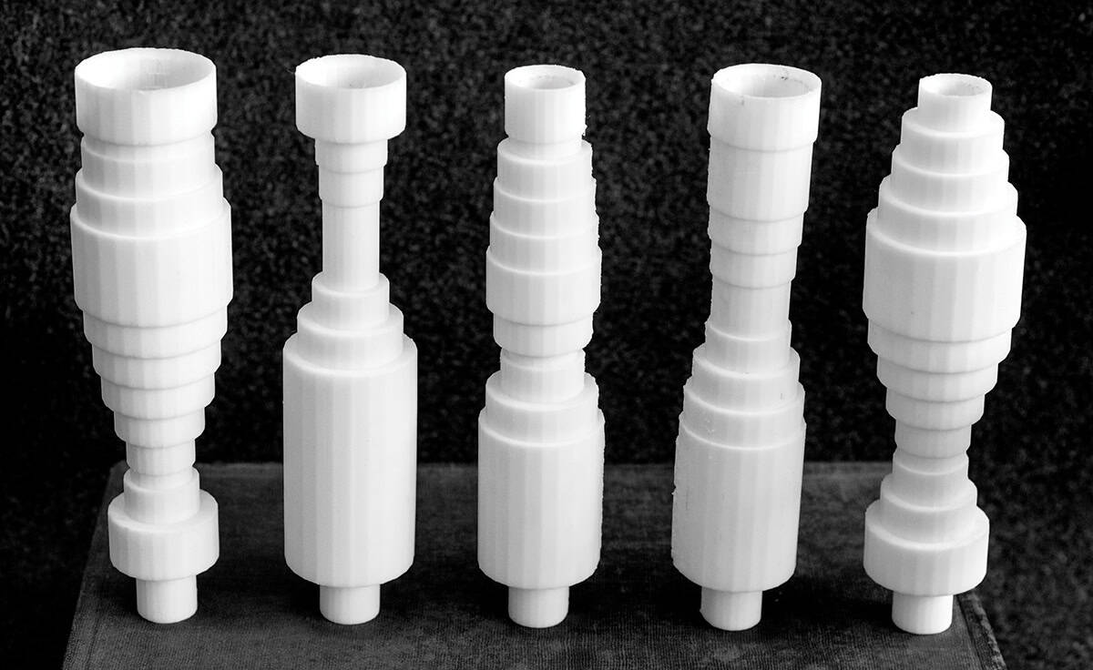 Physical models, which accurately represent the computational models, of the longitudinal axis of the real vocal tracts