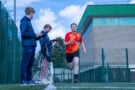 person running with people taking data