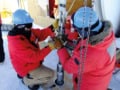Construction workers at the Askaryan Radio Array