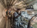 A maintenance worker at CERN’s Large Hadron Collider