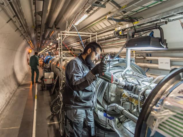 A maintenance worker at CERN’s Large Hadron Collider