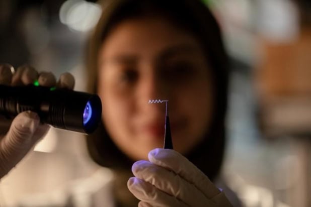 A researcher with a spiral catheter