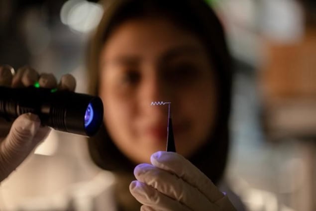 A researcher with a spiral catheter A researcher with a spiral catheter