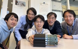 The QST research team with the new high-resolution PET scanner