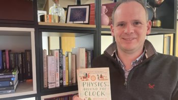 Photo of Michael Banks holding his new book