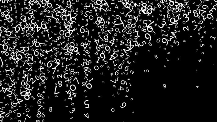 White numbers falling down a dark screen