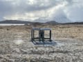 A radio antenna shaped like a table in remote tundra