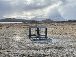 A radio antenna shaped like a table in remote tundra