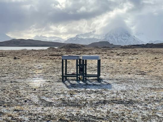 A radio antenna shaped like a table in remote tundra