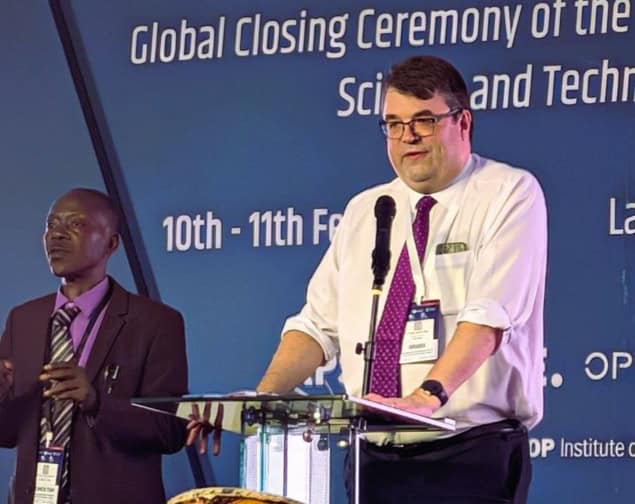 Tom Grinyer speaking at the closing ceremony of the IYQ