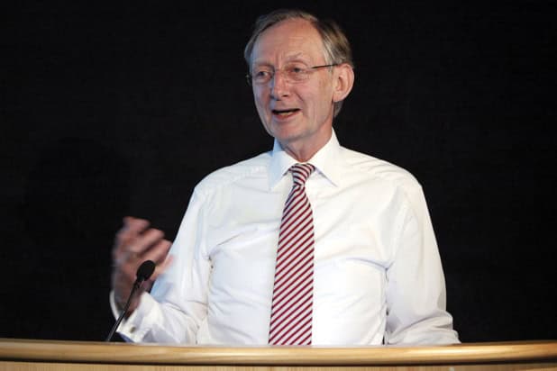 Man speaking at a podium