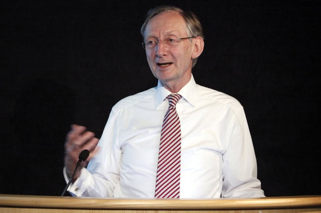 Man speaking at a podium