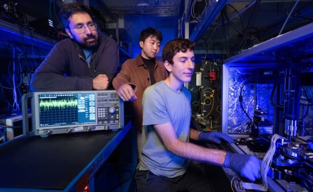 Stanford researchers measure an optical amplifier chip in the lab