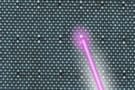 Illustration of how an electron beam is used to modify a crystal