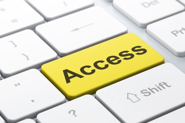 Computer keyboard with a gold button labelled Access