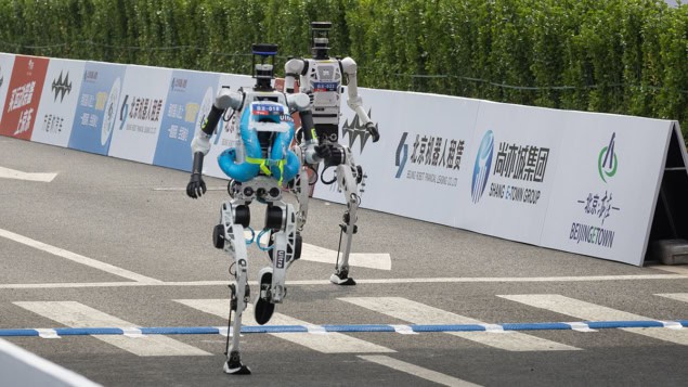 Humanoid robots cross finish line in Beijing E-Town Half Marathon and Humanoid Robot Half Marathon, China - 19 Apr 2026