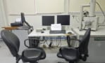 empty desk unused microscope in lab in argentina