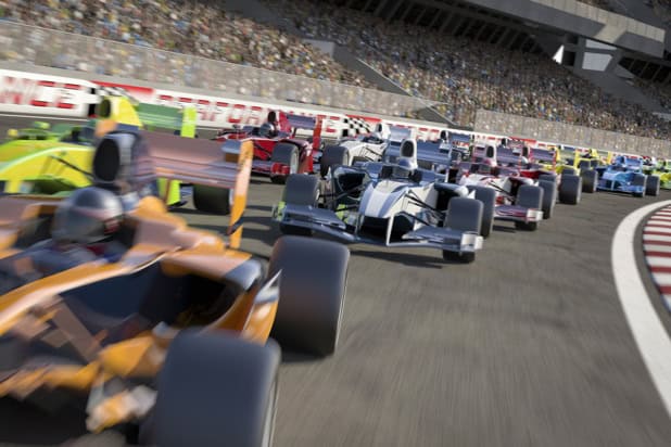 Racing cars on track with crowds in background illustration