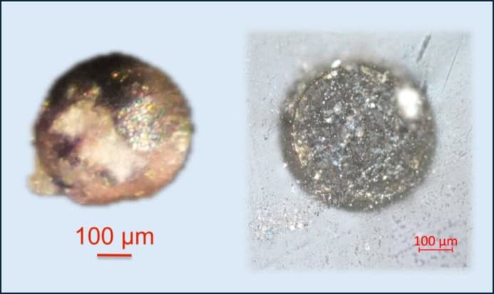 Microscope images of a metal sphere found in hiroshimaite