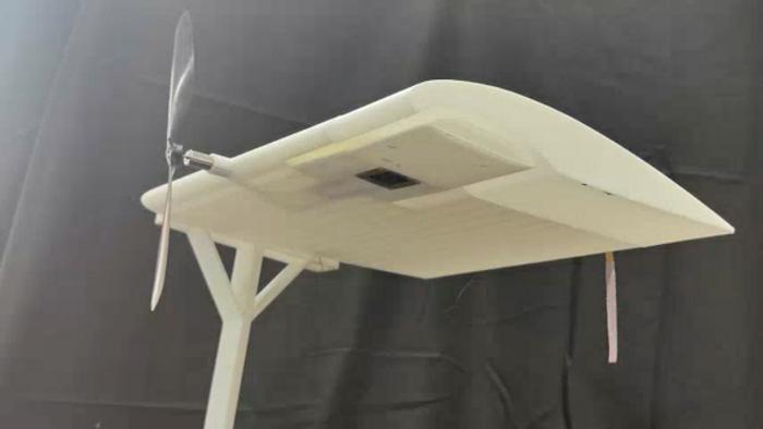 Stationary drone with laser-powered receiver
