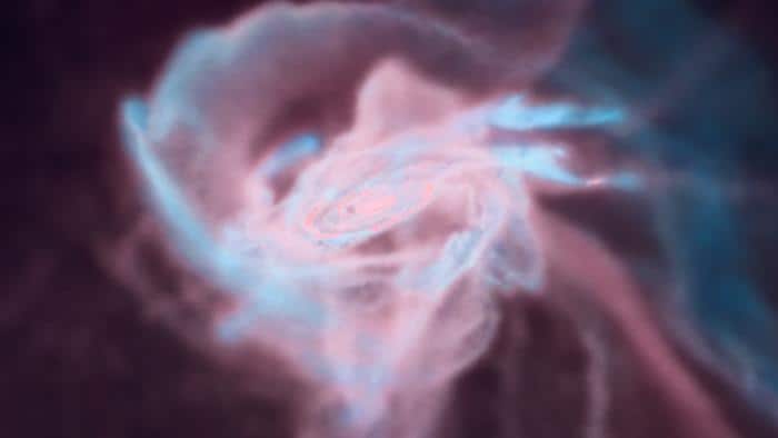 A glowing gas cloud mainly coloured pink, with areas of blue